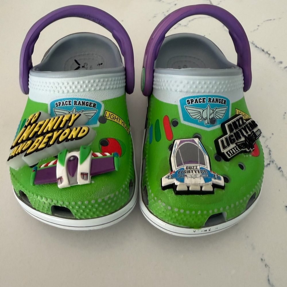 CROCS Kids Green Space Ranger Clogs with Purple Heel Straps